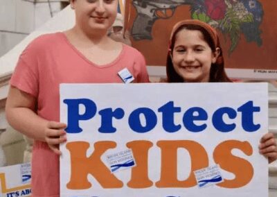 Lydia, Charlotte DiSanto at the RICAGV Rally for The Safe Schools Act, June 11 2019 RI State House