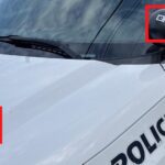 AR-15 bullet holes in Providence police car August 2021