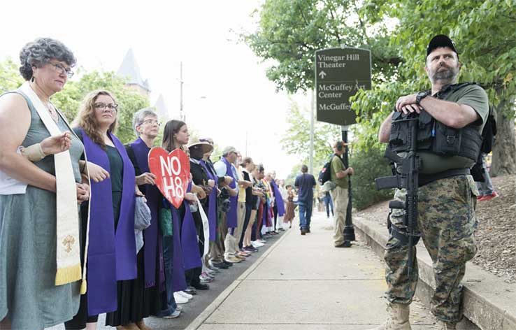 Armed protestors seek to intimidate faith leaders, Charlottesville VA 2020