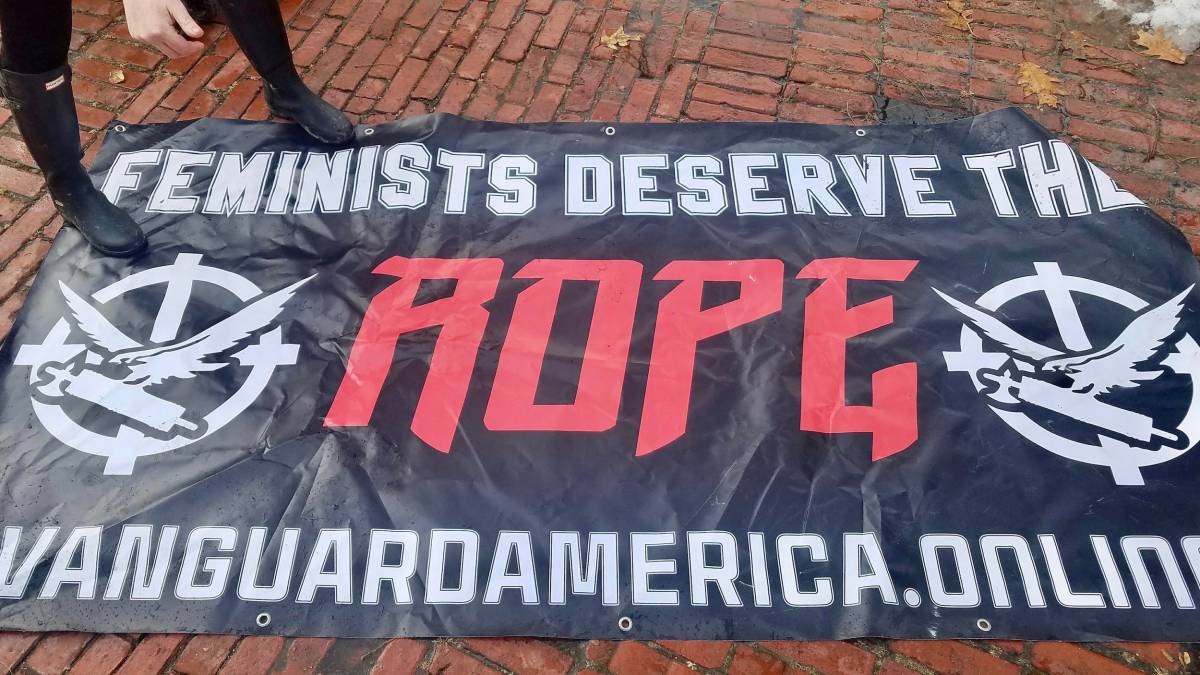 Misogynistic banner at Women's March in Providence, March 2018